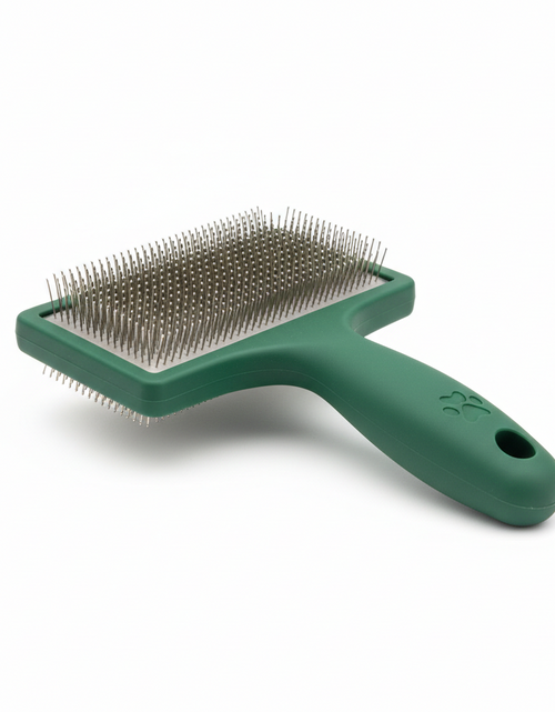 Load image into Gallery viewer, Green pet grooming brush on a white background
